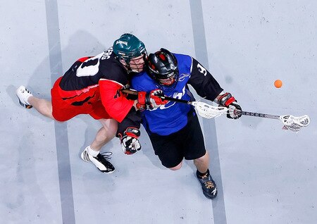 MELBOURNE, AUSTRALIA - OCTOBER 23:  Jeff Zywicki of West is tackled by Keith Nyberg of East during the National Lacrosse League All Star Series at Hisense Arena on October 23, 2009 in Melbourne, Australia.  <br /><br /><span class="help">(Photo by Quinn Rooney/Getty Images)</span>