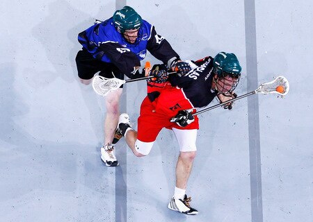 MELBOURNE, AUSTRALIA - OCTOBER 23:  Darren Nicholas playing for East is tackled by Ben Newman of West during the National Lacrosse League All Star Series at Hisense Arena on October 23, 2009 in Melbourne, Australia.  <br /><br /><span class="help">(Photo by Quinn Rooney/Getty Images)</span>
