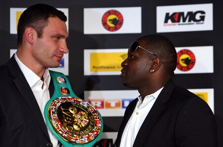 BERN, SWITZERLAND - OCTOBER 23:  Vitali Klitschko (L) and Kevin Johnson pose for the media during a press conference at the Post Finance Arena on October 23, 2009 in Bern, Switzerland. The WBC Heavyweight Championship fight between Vitali Klitschko of Ukraine and Kevin Johnson of the United States will take place at the Finance Arena on December 12, 2009 in Bern, Switzerland.  <br /><br /><span class="help">(Photo by Miguel Villagran/Bongarts/Getty Images)</span>