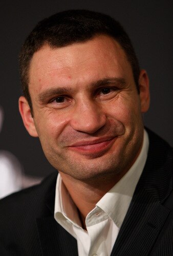 BERN, SWITZERLAND - OCTOBER 23:  Vitali Klitschko smiles during a press conference at the Post Finance Arena on October 23, 2009 in Bern, Switzerland. The WBC Heavyweight Championship fight between Vitali Klitschko of Ukraine and Kevin Johnson of the United States will take place at the Finance Arena on December 12, 2009 in Bern, Switzerland.  <br /><br /><span class="help">(Photo by Miguel Villagran/Bongarts/Getty Images)</span>
