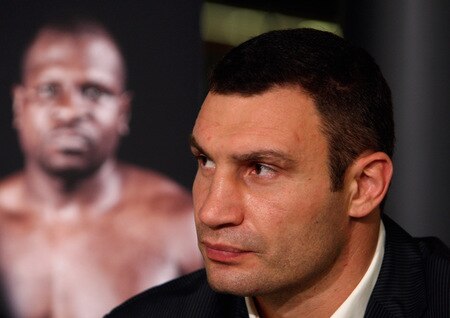 BERN, SWITZERLAND - OCTOBER 23:  Vitali Klitschko looks on next to a picture of Kevin Johnson during a press conference at the Post Finance Arena on October 23, 2009 in Bern, Switzerland. The WBC Heavyweight Championship fight between Vitali Klitschko of Ukraine and Kevin Johnson of the United States will take place at the Finance Arena on December 12, 2009 in Bern, Switzerland.  <br /><br /><span class="help">(Photo by Miguel Villagran/Bongarts/Getty Images)</span>