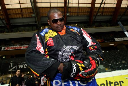 BERN, SWITZERLAND - OCTOBER 23:  Kevin Johnson puts on ice hockey gloves on the ice of the Post Finance Arena after a news conference October 23, 2009 in Bern, Switzerland. The WBC Heavyweight Championship fight between Vitali Klitschko of Ukraine and Kevin Johnson of the United States will take place at the Finance Arena on December 12, 2009 in Bern, Switzerland.  <br /><br /><span class="help">(Photo by Miguel Villagran/Bongarts/Getty Images)</span>