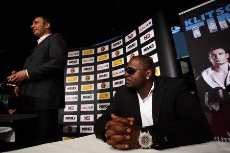BERN, SWITZERLAND - OCTOBER 23: Kevin Johnson (R) listens as Vitali Klitschko (L) addresses the media during a  press conference at the Post Finance Arena on October 23, 2009 in Bern, Switzerland. The WBC Heavyweight Championship fight between Vitali Klitschko of Ukraine and Kevin Johnson of the United States will take place at the Finance Arena on December 12, 2009 in Bern, Switzerland.  <br /><br /><span class="help">(Photo by Miguel Villagran/Bongarts/Getty Images)</span>