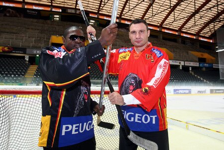 BERN, SWITZERLAND - OCTOBER 23:  Vitali Klitschko (R) and Kevin Johnson pose for the media on the ice of the Post Finance Arena after a news conference October 23, 2009 in Bern, Switzerland. The WBC Heavyweight Championship fight between Vitali Klitschko of Ukraine and Kevin Johnson of the United States will take place at the Finance Arena on December 12, 2009 in Bern, Switzerland.  <br /><br /><span class="help">(Photo by Miguel Villagran/Bongarts/Getty Images)</span>