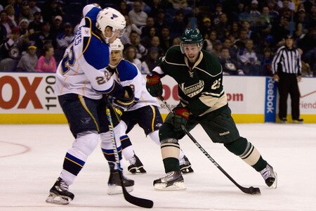 ST. LOUIS, MO. - OCTOBER 23: Eric Belanger #25 of the St. Louis Blues moves the puck up ice against the Minnesota Wild at the Scottrade Center on October 23, 2009 in St. Louis, Missouri.  <br /><br /><span class="help">(Photo by Dilip Vishwanat/Getty Images)</span>
