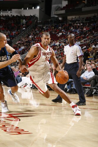 HOUSTON - OCTOBER 23:  Shane Battier #31 of the Houston Rockets drives the ball past Jason Kidd #2 of the Dallas Mavericks on October 23, 2009 at the Toyota Center in Houston, Texas. <br /><br /><span class="help">(Photo by Bill Baptist/NBAE via Getty Images)</span>