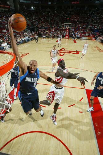HOUSTON - OCTOBER 23:  Shawn Marion #0 of the Dallas Mavericks shoots the ball over Pops Mensah-Bonsu #21of the Houston Rockets on October 23, 2009 at the Toyota Center in Houston, Texas. <br /><br /><span class="help">(Photo by Bill Baptist/NBAE via Getty Images)</span>