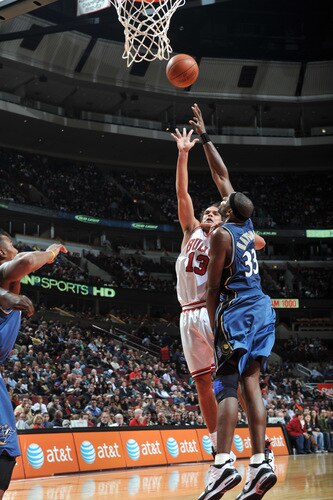 CHICAGO - OCTOBER 23: Joakim Noah #13 of the Chicago Bulls and Brendan Haywood #33 of the Washington Wizards go up for the rebound during the NBA preseason game on October 23, 2009 at the United Center in Chicago, Illinois. <br /><br /><span class="help">(Photo by Randy Belice/NBAE via Getty Images)</span>