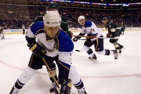 ST. LOUIS, MO. - OCTOBER 23: Keith Tkachuk #7 of the St. Louis Blues controls the puck along the boards against the Minnesota Wild at the Scottrade Center on October 23, 2009 in St. Louis, Missouri.  The Blues beat the Wild 3-1.  <br /><br /><span class="help">(Photo by Dilip Vishwanat/Getty Images)</span>