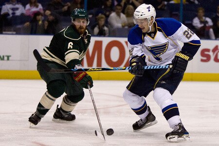 ST. LOUIS, MO. - OCTOBER 23: Brad Boyes #22 of the St. Louis Blues   looks to get past against the Greg Zanon #6 Minnesota Wild at the Scottrade Center on October 23, 2009 in St. Louis, Missouri.  The Blues beat the Wild 3-1.  <br /><br /><span class="help">(Photo by Dilip Vishwanat/Getty Images)</span>