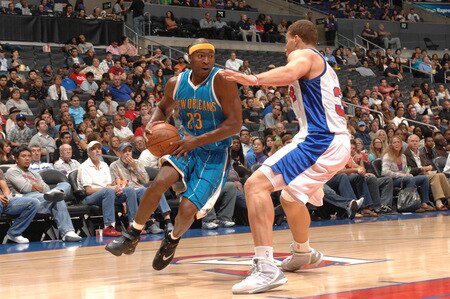 LOS ANGELES - OCTOBER 23: Devin Brown #23 of the New Orleans Hornets handles the ball against Blake Griffin #32 of the Los Angeles Clippers at Staples Center on October 23, 2009 in Los Angeles, California. <br /><br /><span class="help">(Photo by Noah Graham/NBAE via Getty Images)</span>