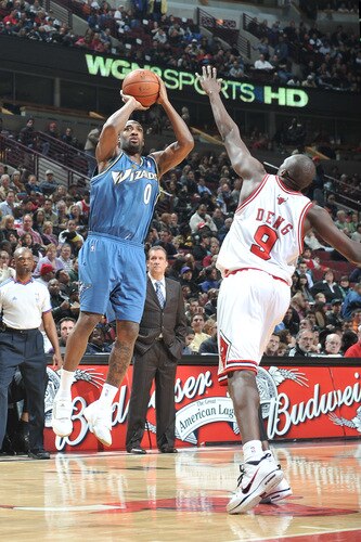 CHICAGO - OCTOBER 23:  Gilbert Arenas #0 of the Washington Wizards shoots the ball over Luol Deng #9 of the Chicago Bulls during the NBA preseason game on October 23, 2009 at the United Center in Chicago, Illinois. <br /><br /><span class="help">(Photo by Randy Belice/NBAE via Getty Images)</span>