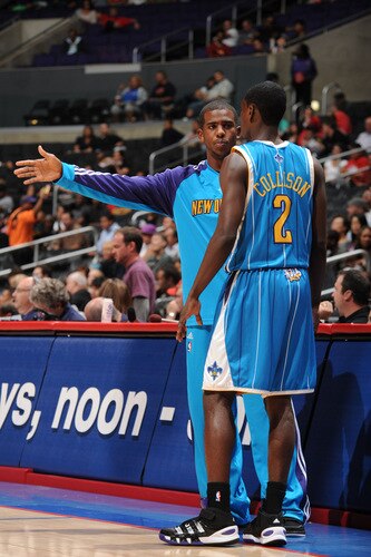 LOS ANGELES - OCTOBER 23: Chris Paul #3 of the New Orleans Hornets directs Darren Collison #2 during their game against the Los Angeles Clippers at Staples Center on October 23, 2009 in Los Angeles, California. <br /><br /><span class="help">(Photo by Noah Graham/NBAE via Getty Images)</span>