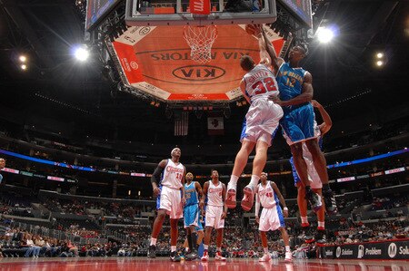 LOS ANGELES - OCTOBER 23: Hilton Armstrong #12 of the New Orleans Hornets has his shot blocked by Blake Griffin #12 of the Los Angeles Clippers at Staples Center on October 23, 2009 in Los Angeles, California. <br /><br /><span class="help">(Photo by Noah Graham/NBAE via Getty Images)</span>