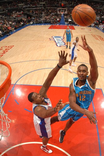LOS ANGELES - OCTOBER 23: Hilton Armstrong #12 of the New Orleans Hornets goes up for a shot against DeAndre Jordan #9 of the Los Angeles Clippers at Staples Center on October 23, 2009 in Los Angeles, California. <br /><br /><span class="help">(Photo by Noah Graham/NBAE via Getty Images)</span>