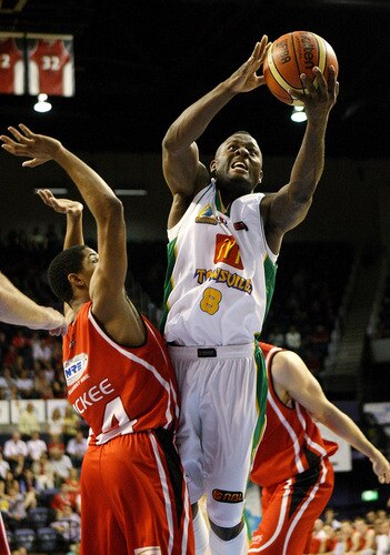WOLLONGONG, AUSTRALIA - OCTOBER 24: Corey Williams of Townsville drives to the basket during the round five NBL match between the Wollongong Hawks and the Townsville Crocodiles at Wollongong Entertainment Centre on October 24, 2009 in Wollongong, Australia.  <br /><br /><span class="help">(Photo by Mark Nolan/Getty Images)</span>