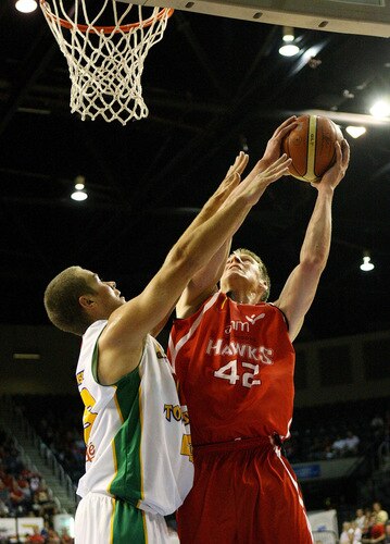 WOLLONGONG, AUSTRALIA - OCTOBER 24: David Gruber of the Hawks tries to shoot during the round five NBL match between the Wollongong Hawks and the Townsville Crocodiles at Wollongong Entertainment Centre on October 24, 2009 in Wollongong, Australia.  <br /><br /><span class="help">(Photo by Mark Nolan/Getty Images)</span>