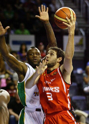 WOLLONGONG, AUSTRALIA - OCTOBER 24:  Rhys Martin of the Hawks shoots for the basket during the round five NBL match between the Wollongong Hawks and the Townsville Crocodiles at Wollongong Entertainment Centre on October 24, 2009 in Wollongong, Australia.  <br /><br /><span class="help">(Photo by Mark Nolan/Getty Images)</span>