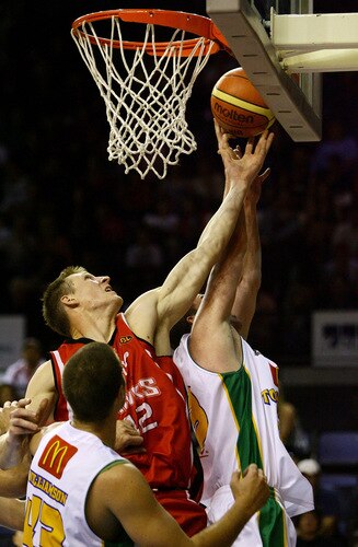 WOLLONGONG, AUSTRALIA - OCTOBER 24: David Gruber of the Hawks rebounds during the round five NBL match between the Wollongong Hawks and the Townsville Crocodiles at Wollongong Entertainment Centre on October 24, 2009 in Wollongong, Australia.  <br /><br /><span class="help">(Photo by Mark Nolan/Getty Images)</span>