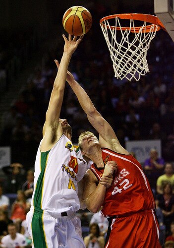 WOLLONGONG, AUSTRALIA - OCTOBER 24: Russell Hinder of Townsville and David Gruber of the Hawks contest possession during the round five NBL match between the Wollongong Hawks and the Townsville Crocodiles at Wollongong Entertainment Centre on October 24, 2009 in Wollongong, Australia.  <br /><br /><span class="help">(Photo by Mark Nolan/Getty Images)</span>