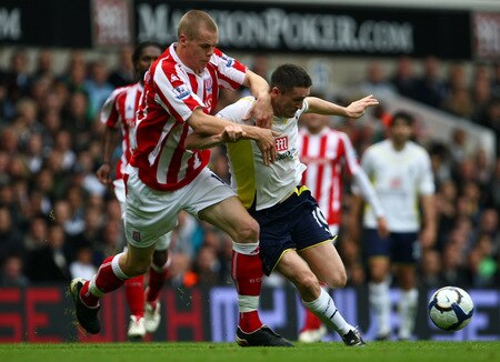 LONDON, ENGLAND - OCTOBER 24:  Robbie Keane of Tottenham Hotspur is challenged by Andy Wilkinson of Stoke City during the Barclays Premier League match between Tottenham Hotspur and Stoke City at White Hart Lane on October 24, 2009 in London, England.  <br /><br /><span class="help">(Photo by Clive Rose/Getty Images)</span>