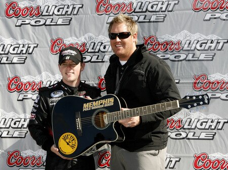 MEMPHIS, TN - OCTOBER 24:  Justin Allgaier, driver of the #12 Verizon Wireless Dodge poses for pictures after winning the pole position and the Coors Light Pole award for the NASCAR Nationwide series Kroger 'On Track For Cure' 250 race at the Memphis Motorsports Park on October 24, 2009 in Memphis, Tennessee.  <br /><br /><span class="help">(Photo by John Sommers II/Getty Images)</span>