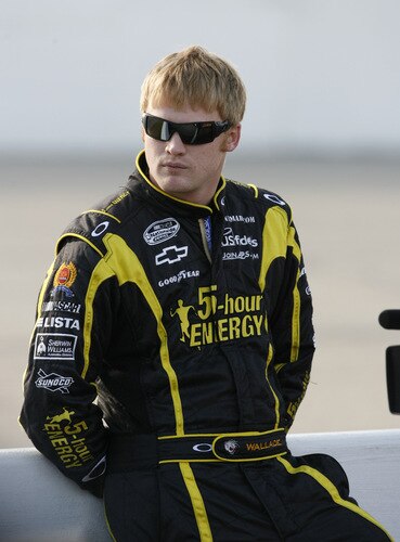 MEMPHIS, TN - OCTOBER 24:   Steve Wallace, driver of the #66 5-hour Energy Chevrolet stands on the grid during qualifying for the NASCAR Nationwide series Kroger 'On Track For  Cure' 250 race at the Memphis Motorsports Park on October 24, 2009 in Memphis, Tennessee.  <br /><br /><span class="help">(Photo by John Sommers II/Getty Images)</span>