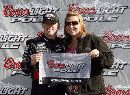 MEMPHIS, TN - OCTOBER 24:  Justin Allgaier, driver of the #12 Verizon Wireless Dodge poses for pictures after winning the pole position and the Coors Light Pole award for the NASCAR Nationwide series Kroger 'On Track For  Cure' 250 race at the Memphis Motorsports Park on October 24, 2009 in Memphis, Tennessee.  <br /><br /><span class="help">(Photo by John Sommers II/Getty Images)</span>