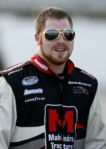 MEMPHIS, TN - OCTOBER 24:  Robert Richardson Jr. , driver of the #23 Mahindra Chevrolet stands on the grid during qualifying for the NASCAR Nationwide series Kroger 'On Track For  Cure' 250 race at the Memphis Motorsports Park on October 24, 2009 in Memphis, Tennessee.  <br /><br /><span class="help">(Photo by John Sommers II/Getty Images)</span>