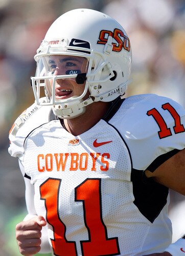 WACO, TX - OCTOBER 24:  Quarterback Zac Robinson #11 of the Oklahoma State Cowboys reacts after scoring a touchdown against the Baylor Bears at Floyd Casey Stadium on October 24, 2009 in Waco, Texas.  <br /><br /><span class="help">(Photo by Ronald Martinez/Getty Images)</span>