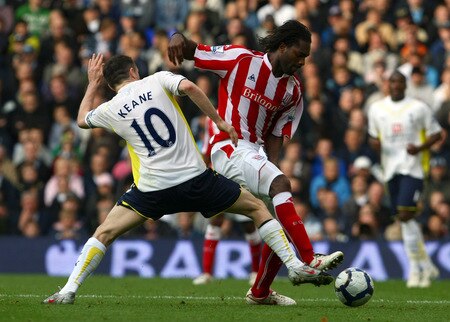 LONDON, ENGLAND - OCTOBER 24:  Salif Diao of Stoke City is challenged by Robbie Keane of Tottenham Hotspur during the Barclays Premier League match between Tottenham Hotspur and Stoke City at White Hart Lane on October 24, 2009 in London, England.  <br /><br /><span class="help">(Photo by Clive Rose/Getty Images)</span>