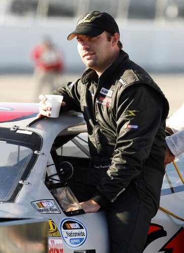MEMPHIS, TN - OCTOBER 24:   Brendan Gaughan, driver of the #61 Specialty Racing Ford sits in his car on the grid during qualifying for the NASCAR Nationwide series Kroger 'On Track For Cure' 250 race at the Memphis Motorsports Park on October 24, 2009 in Memphis, Tennessee.  <br /><br /><span class="help">(Photo by John Sommers II/Getty Images)</span>