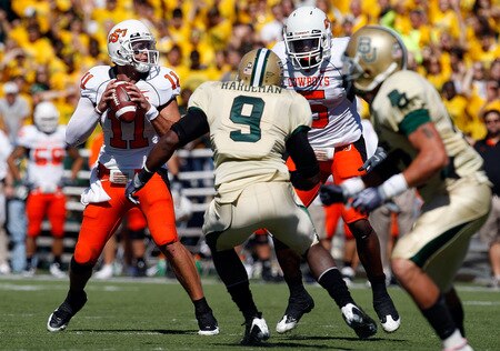 WACO, TX - OCTOBER 24:  Quarterback Zac Robinson #11 of the Oklahoma State Cowboys looks to pass against the Baylor Bears at Floyd Casey Stadium on October 24, 2009 in Waco, Texas.  <br /><br /><span class="help">(Photo by Ronald Martinez/Getty Images)</span>