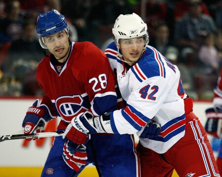 MONTREAL- OCTOBER 24: Artem Anisimov #42 of the New York Rangers defends against Kyle Chipchura #28 of the Montreal Canadiens during the NHL game on October 24, 2009 at the Bell Centre in Montreal, Quebec, Canada. <br /><br /><span class="help">(Photo by Richard Wolowicz/Getty Images)</span>