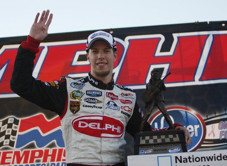 MEMPHIS, TN - OCTOBER 24:  Brad Keselowski, driver of the #88 Delphi Chevrolet celebrates winning the NASCAR Nationwide series Kroger 'On Track For Cure' 250 race at the Memphis Motorsports Park on October 24, 2009 in Memphis, Tennessee.  <br /><br /><span class="help">(Photo by John Sommers II/Getty Images)</span>