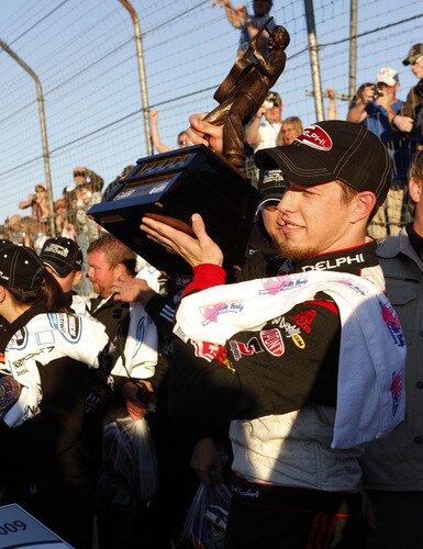 MEMPHIS, TN - OCTOBER 24:  Brad Keselowski, driver of the #88 Delphi Chevrolet holds up the winners trophy after winning the NASCAR Nationwide series Kroger 'On Track For Cure' 250 race at the Memphis Motorsports Park on October 24, 2009 in Memphis, Tennessee.  <br /><br /><span class="help">(Photo by John Sommers II/Getty Images)</span>