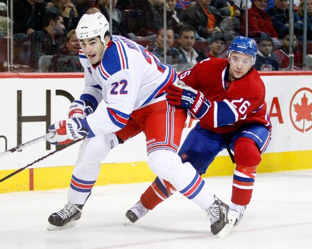 MONTREAL- OCTOBER 24: Brian Boyle #22 of the New York Rangers skates while being defended by Josh Gorges #26 of the Montreal Canadiens during the NHL game on October 24, 2009 at the Bell Centre in Montreal, Quebec, Canada. <br /><br /><span class="help">(Photo by Richard Wolowicz/Getty Images)</span>