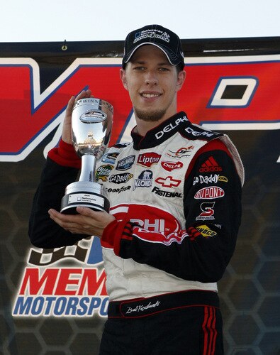 MEMPHIS, TN - OCTOBER 24:   Brad Keselowski , driver of the #88 Delphi Chevrolet poses with the Nationwide trophy after winning the NASCAR Nationwide series Kroger 'On Track For  Cure' 250 race at the Memphis Motorsports Park on October 24, 2009 in Memphis, Tennessee.  <br /><br /><span class="help">(Photo by John Sommers II/Getty Images)</span>