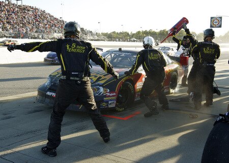 MEMPHIS, TN - OCTOBER 24:   Steve Wallace, driver of the #66 5-Hiur Energy Chevrolet gets tires and fuel during a pits stop in the NASCAR Nationwide series Kroger 'On Track For  Cure' 250 race at the Memphis Motorsports Park on October 24, 2009 in Memphis, Tennessee.  <br /><br /><span class="help">(Photo by John Sommers II/Getty Images)</span>
