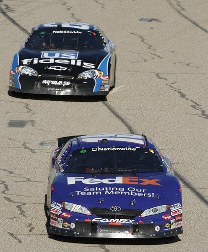 MEMPHIS, TN - OCTOBER 24:   Kyle Busch, driver of the # 18 FedEx Toyota leads the pack during the NASCAR Nationwide series Kroger 'On Track For  Cure' 250 race at the Memphis Motorsports Park on October 24, 2009 in Memphis, Tennessee.  <br /><br /><span class="help">(Photo by John Sommers II/Getty Images)</span>