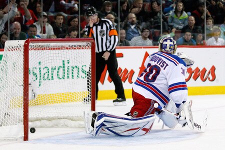 MONTREAL- OCTOBER 24: Henrik Lundqvist #30 of the New York Rangers lets in the overtime goal on a shot by Mike Cammalleri #13 of the Montreal Canadiens during the NHL game on October 24, 2009 at the Bell Centre in Montreal, Quebec, Canada. <br /><br /><span class="help">(Photo by Richard Wolowicz/Getty Images)</span>