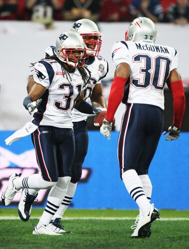LONDON, ENGLAND - OCTOBER 25:  Brandon Meriweather (#31) of the New England Patriotscelebrates scoring a touchdown with teamate Brandon McGowan (#30) of the New England Patriotsduring the NFL International Series match between New England Patriots and Tampa Bay Buccaneers at Wembley Stadium on October 25, 2009 in London, England. This is the third occasion where a regular season NFL match has been played in London.  <br /><br /><span class="help">(Photo by Elsa/Getty Images)</span>