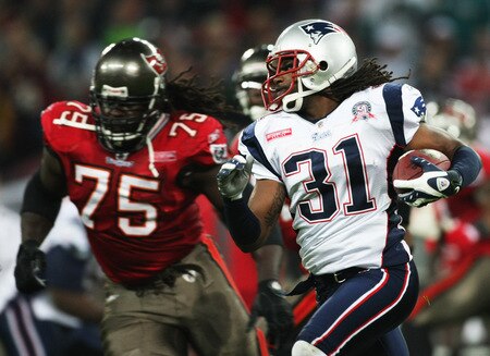 LONDON, ENGLAND - OCTOBER 25: Brandon Meriweather (#31) of the New England Patriotsruns with the ball after an intercept during the NFL International Series match between New England Patriots and Tampa Bay Buccaneers at Wembley Stadium on October 25, 2009 in London, England. This is the third occasion where a regular season NFL match has been played in London.  <br /><br /><span class="help">(Photo by Elsa/Getty Images)</span>