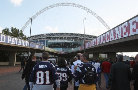 LONDON, ENGLAND - OCTOBER 25:  Fans make their way to the stadium prior to the NFL International Series match between New England Patriots and Tampa Bay Buccaneers at Wembley Stadium on October 25, 2009 in London, England. This is the third occasion where a regular season NFL match has been played in London.  <br /><br /><span class="help">(Photo by Elsa/Getty Images)</span>