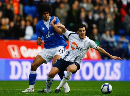 BOLTON, ENGLAND - OCTOBER 25:  Tamir Cohen of Bolton Wanderers (R) comppetes with Marouane Fellaini of Everton during the Barclays Premier League match between Bolton Wanderers and Everton at Reebok Stadium on October 25, 2009 in Bolton, England.  <br /><br /><span class="help">(Photo by Jeff J Mitchell/Getty Images)</span>
