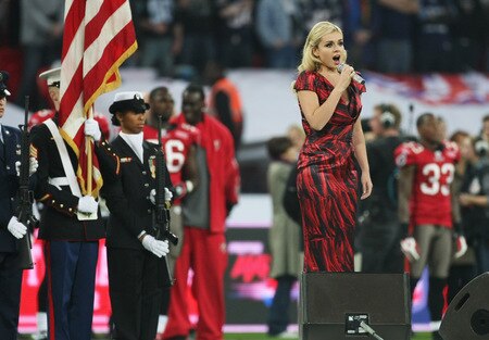 LONDON, ENGLAND - OCTOBER 25:  Singer Katherine Jenkins performs prior to the NFL International Series match between New England Patriots and Tampa Bay Buccaneers at Wembley Stadium on October 25, 2009 in London, England. This is the third occasion where a regular season NFL match has been played in London.  <br /><br /><span class="help">(Photo by Elsa/Getty Images)</span>