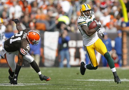 CLEVELAND, OH - OCTOBER 25:  Donald Driver #80 of the Green Bay Packers scores a touchdown in front of Brodney Pool #21 of the Cleveland Browns at Cleveland Browns Stadium on October 25, 2009 in Cleveland, Ohio.  <br /><br /><span class="help">(Photo by Matt Sullivan/Getty Images)</span>