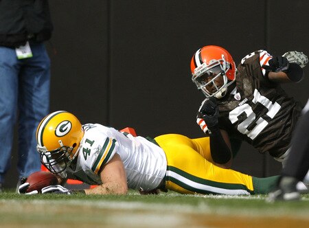 CLEVELAND, OH - OCTOBER 25:  Spencer Havner #41 of the Green Bay Packers scores a touchdown in front of Brodney Pool #21 of the Cleveland Browns at Cleveland Browns Stadium on October 25, 2009 in Cleveland, Ohio.  <br /><br /><span class="help">(Photo by Matt Sullivan/Getty Images)</span>