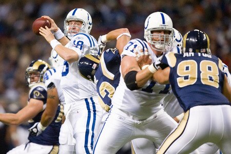 ST. LOUIS, MO - OCTOBER 25: Peyton Manning #18 of the Indianapolis Colts passes against the St. Louis Rams at the Edward Jones Dome on October 25, 2009 in St. Louis, Missouri.  <br /><br /><span class="help">(Photo by Dilip Vishwanat/Getty Images)</span>