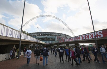 LONDON, ENGLAND - OCTOBER 25:  Fans make their way to the stadium prior to the NFL International Series match between New England Patriots and Tampa Bay Buccaneers at Wembley Stadium on October 25, 2009 in London, England. This is the third occasion where a regular season NFL match has been played in London.  <br /><br /><span class="help">(Photo by Elsa/Getty Images)</span>